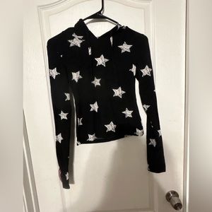 Black hoodie with stars and stripped sleeves
